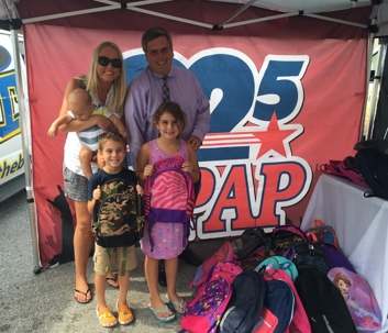 The Virga Law Firm and the local Guardian ad Litem back-to-school supply drive
