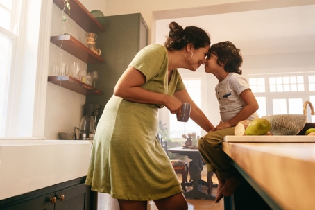 Mother and son in kitchen.